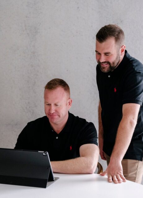 Lifestyle Finance Group Team looking at computer screen