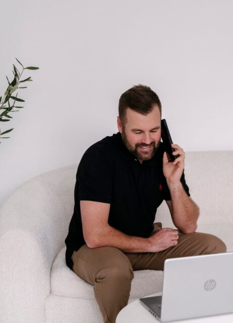 Photo of Lifestyle Finance Group Team Member Nick March on phone
